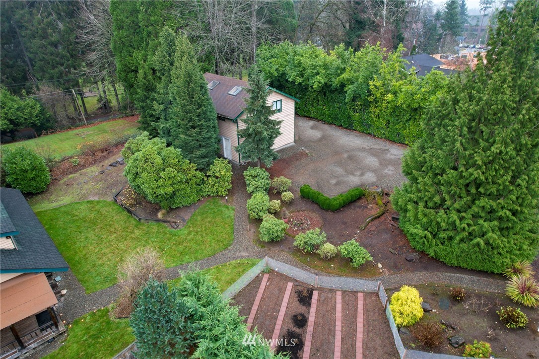 10907 Valley View Road Bothell, WA 98011 - Photo 23 of 32 an aerial view of a house with garden space and street view