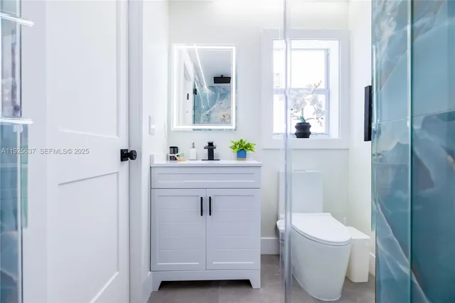 a kitchen with a stove and a microwave