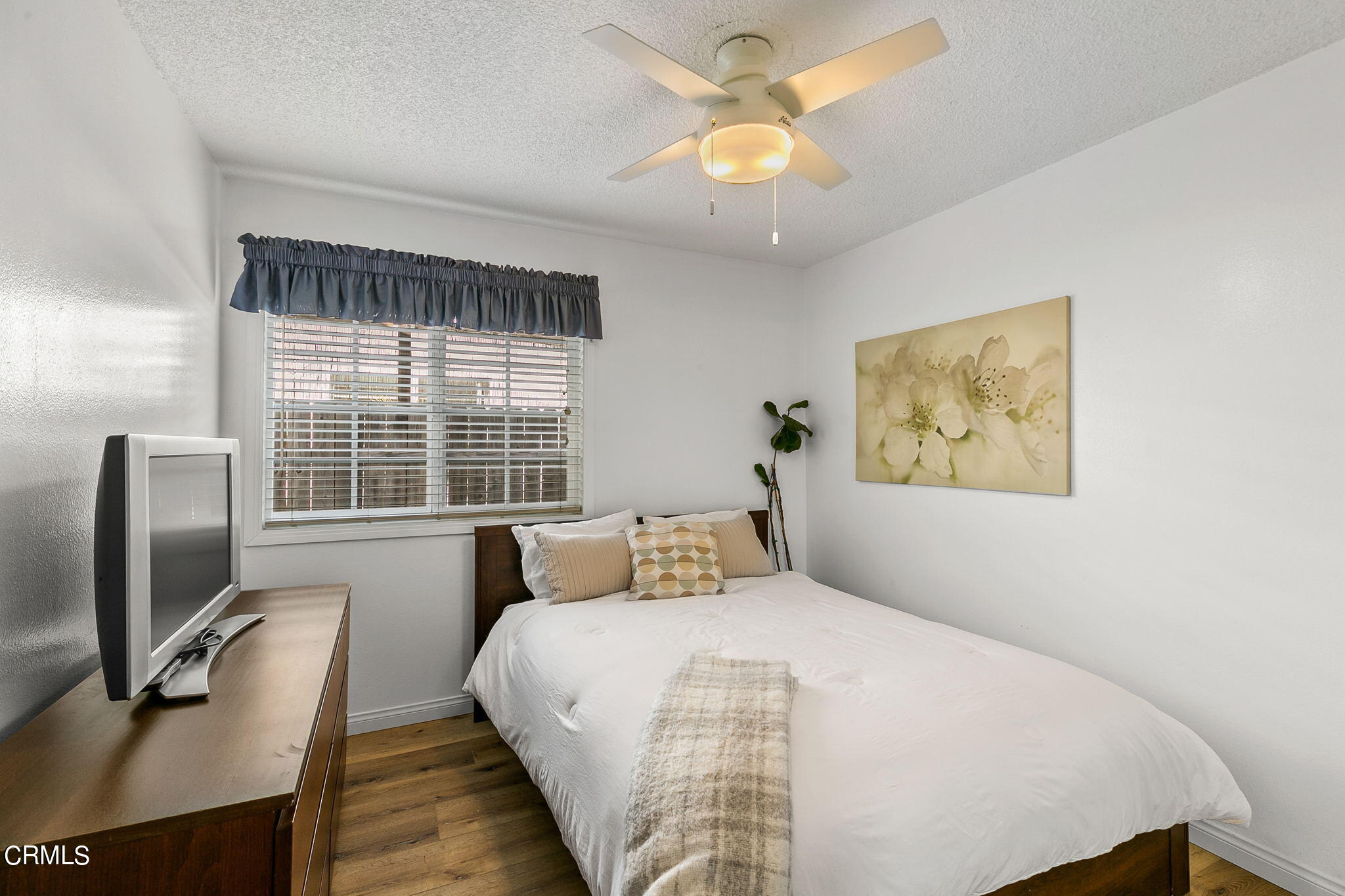 2531 Raft Lane Oxnard, CA 93035 - Photo 20 of 42 a bedroom with a bed and a flat screen tv