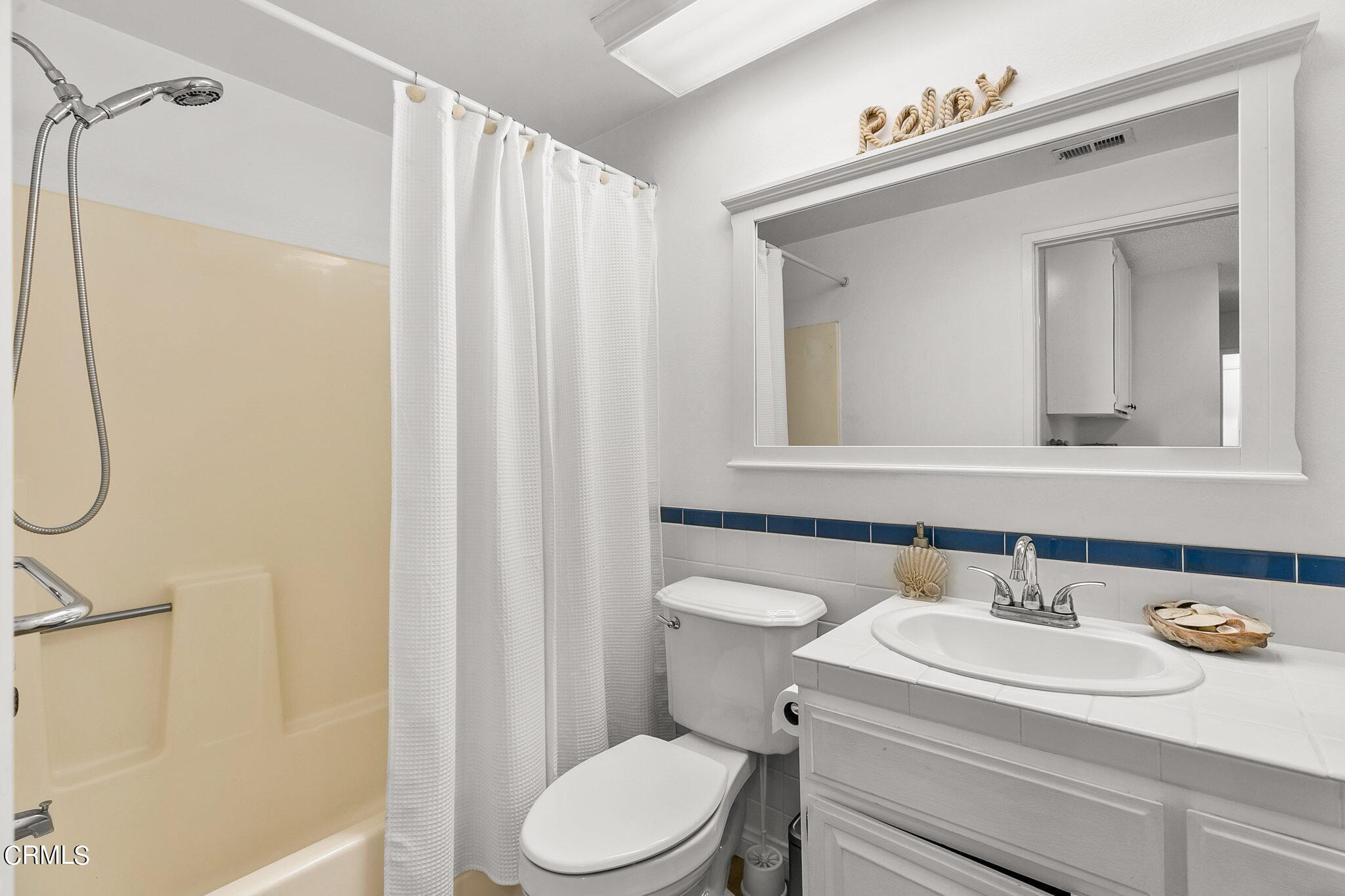 2531 Raft Lane Oxnard, CA 93035 - Photo 24 of 42 a bathroom with a sink a toilet and shower