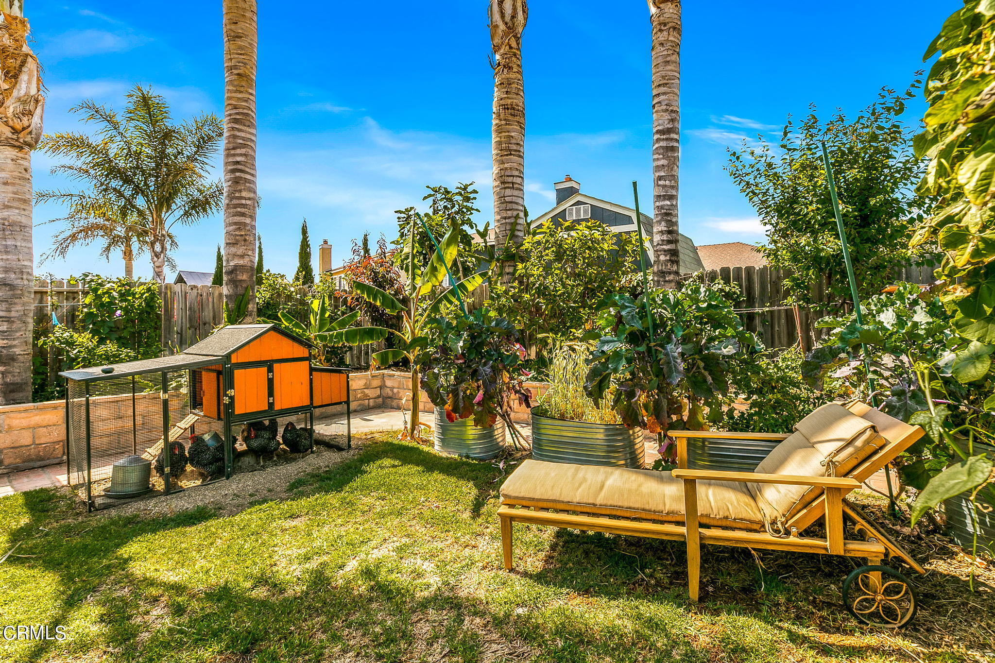 2531 Raft Lane Oxnard, CA 93035 - Photo 30 of 42 a backyard of a house with table and chairs