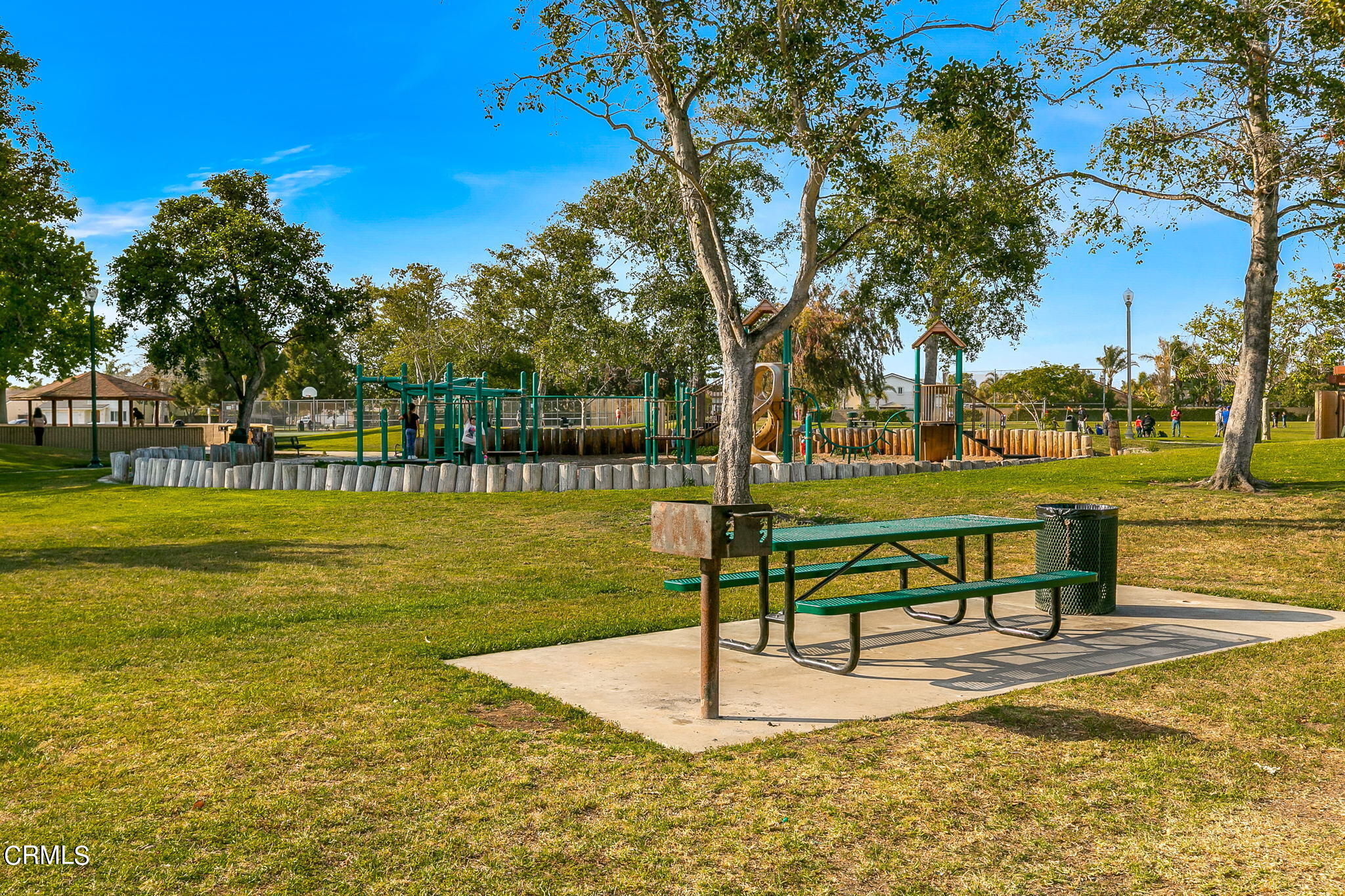 2531 Raft Lane Oxnard, CA 93035 - Photo 33 of 42 a view of a swimming pool with a bench and trees around
