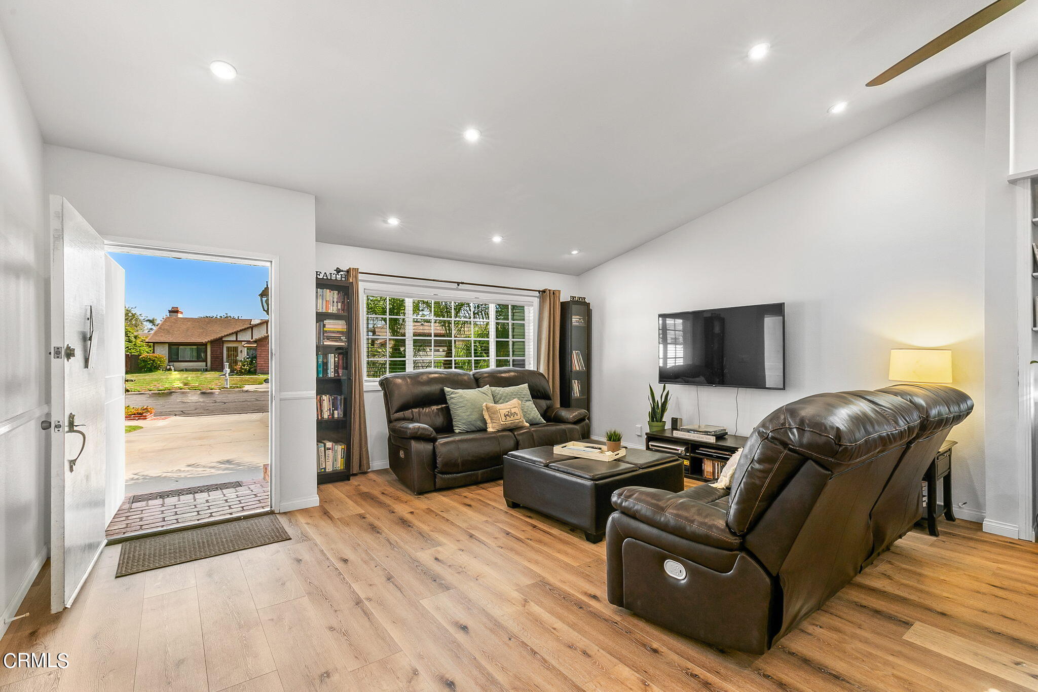 2531 Raft Lane Oxnard, CA 93035 - Photo 4 of 42 a living room with furniture and a flat screen tv
