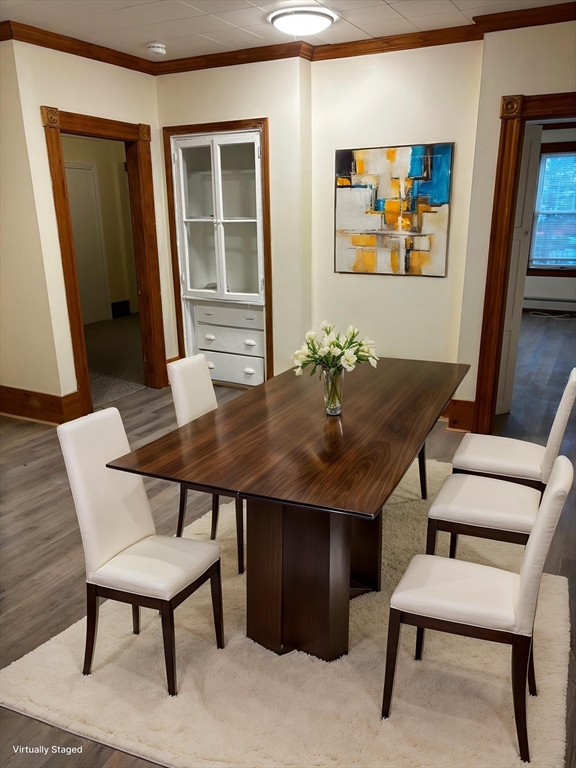 14 Gilkey Court, Unit 1 Watertown, MA 02472 - Photo 2 of 12 a view of a dining room with furniture