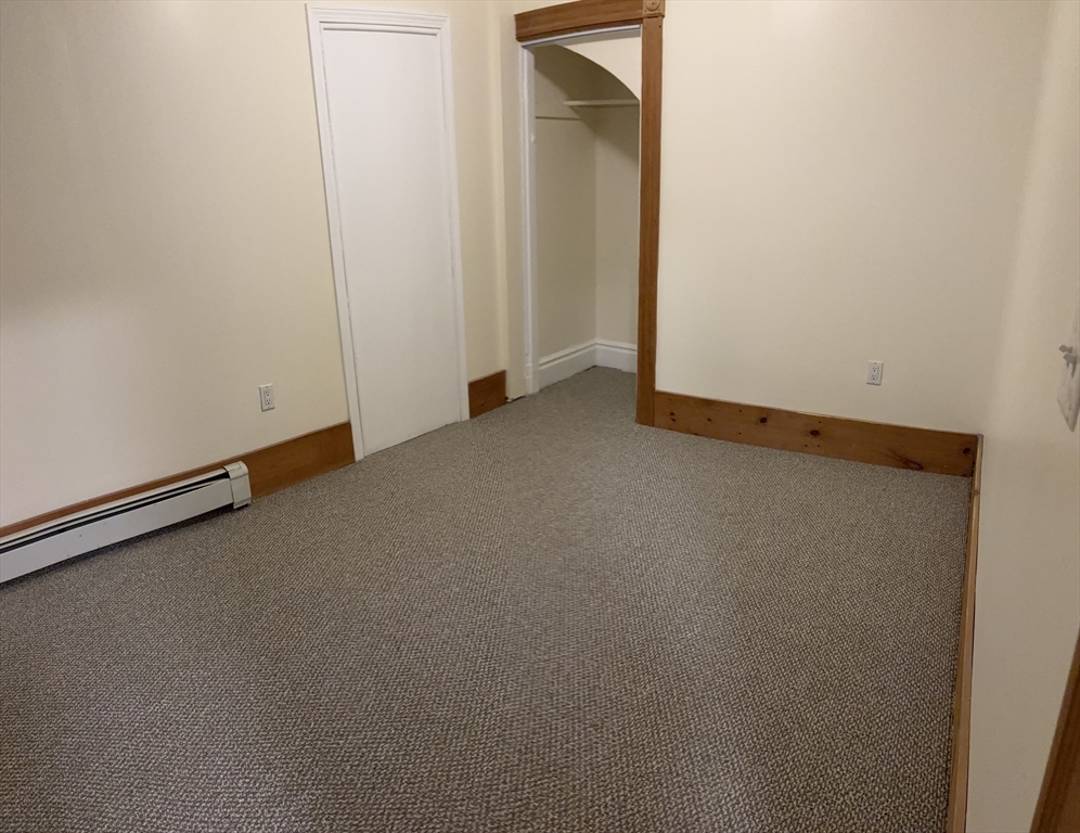 14 Gilkey Court, Unit 1 Watertown, MA 02472 - Photo 6 of 12 a view of an empty room