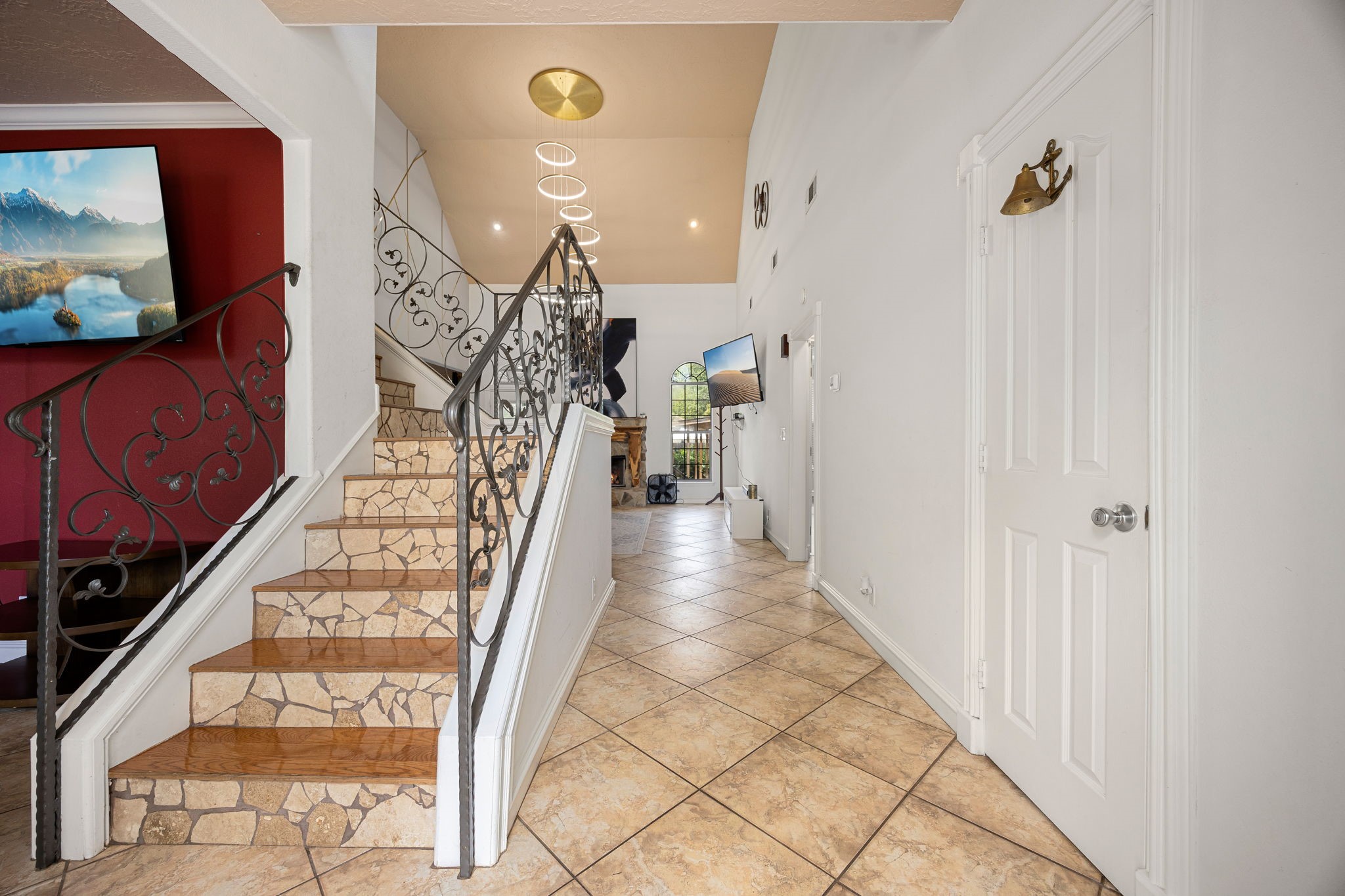 21427 Tophill Drive Spring, TX 77388 - Photo 11 of 50 a view of entryway and hall with wooden floor