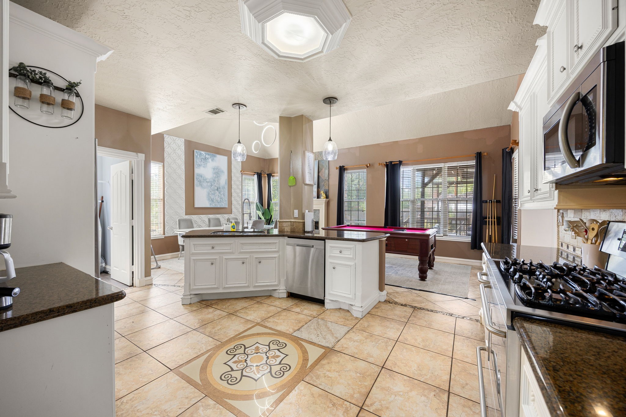 21427 Tophill Drive Spring, TX 77388 - Photo 18 of 50 a large white kitchen with a large window