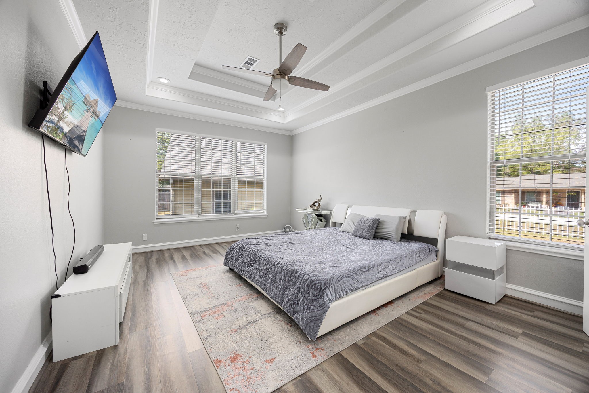 21427 Tophill Drive Spring, TX 77388 - Photo 29 of 50 a spacious bedroom with a bed and a window