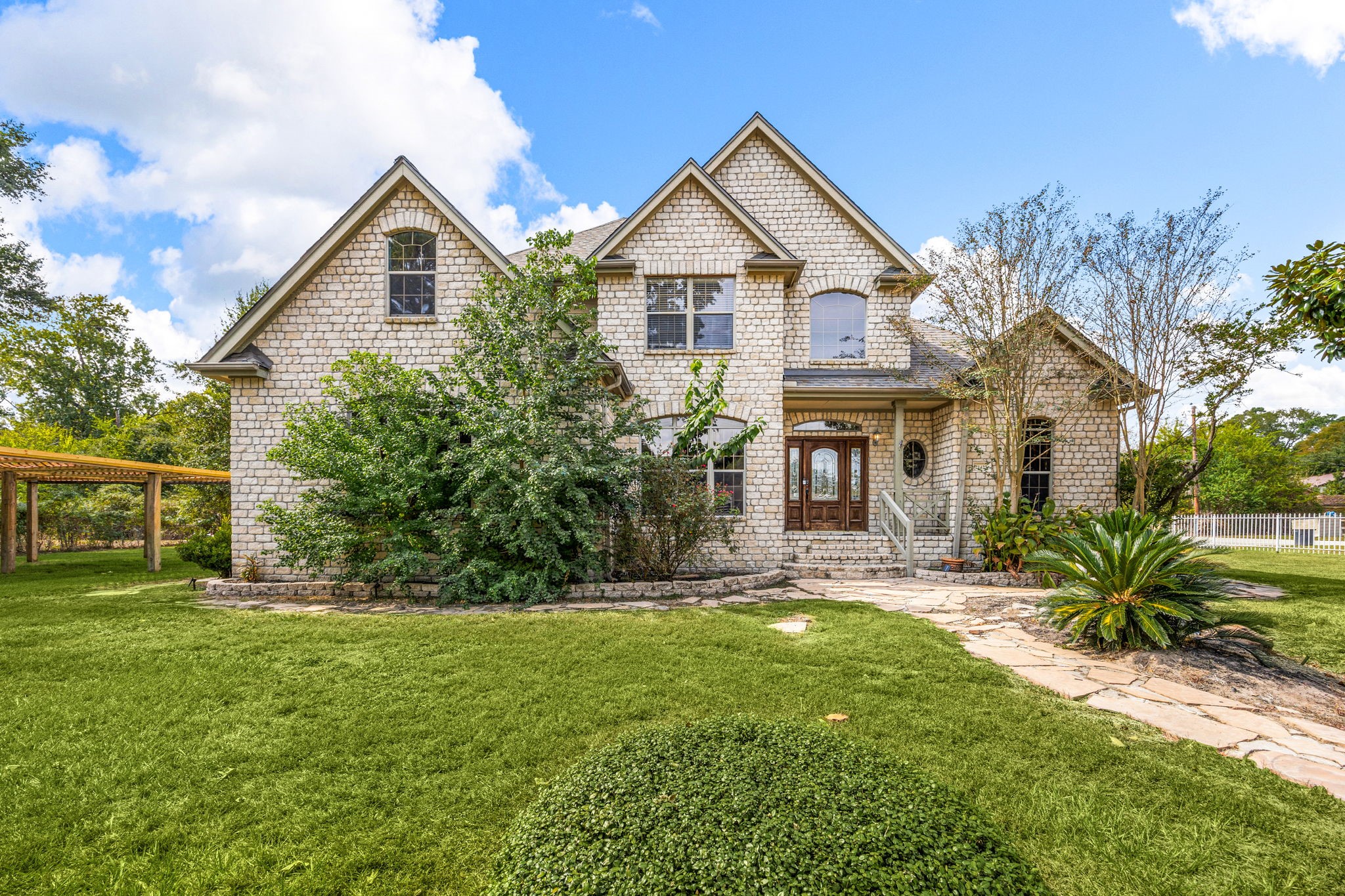 21427 Tophill Drive Spring, TX 77388 - Photo 4 of 50 a front view of a house with a yard
