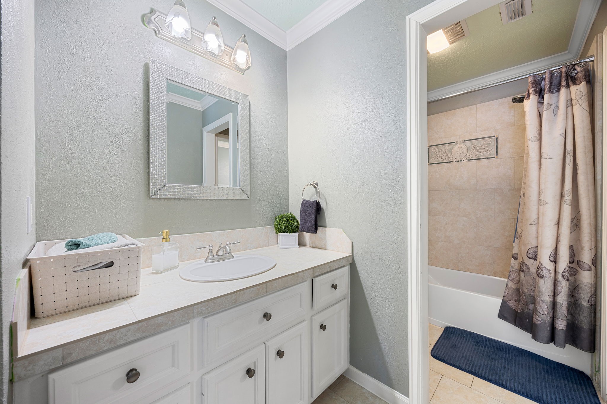 21427 Tophill Drive Spring, TX 77388 - Photo 42 of 50 a bathroom with a sink a vanity and a mirror