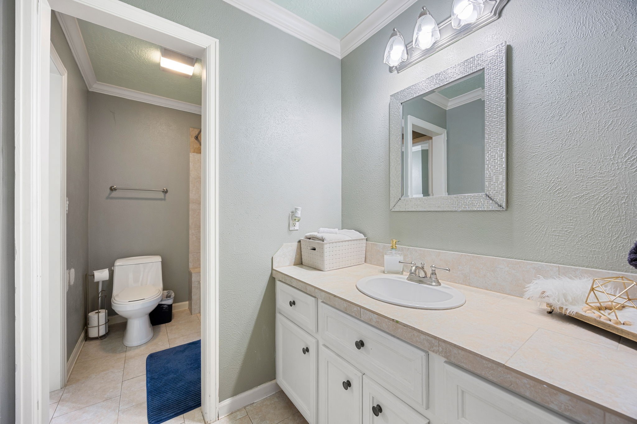 21427 Tophill Drive Spring, TX 77388 - Photo 43 of 50 a bathroom with a sink double vanity and a toilet