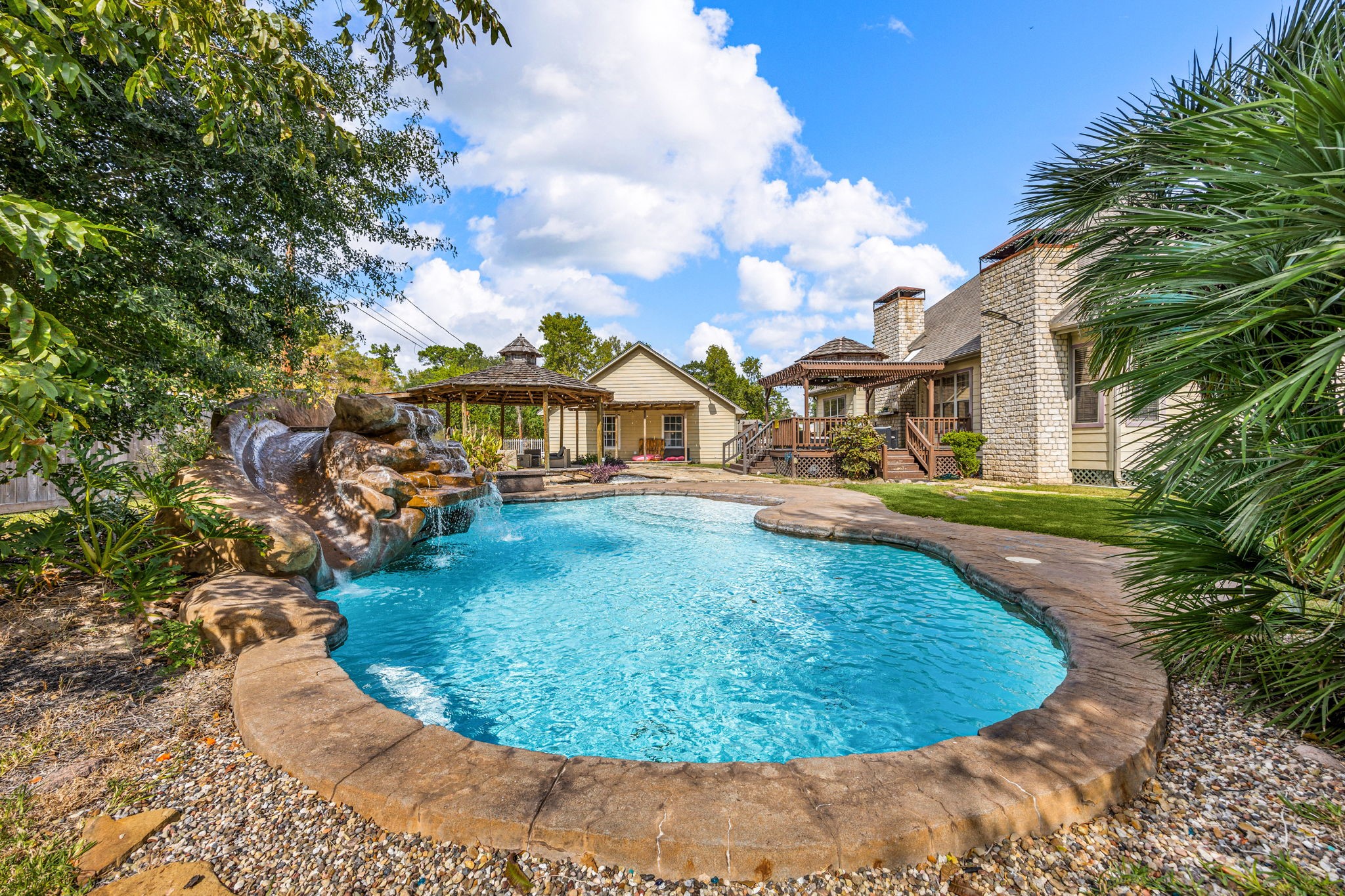 21427 Tophill Drive Spring, TX 77388 - Photo 47 of 50 a view of a swimming pool with a yard