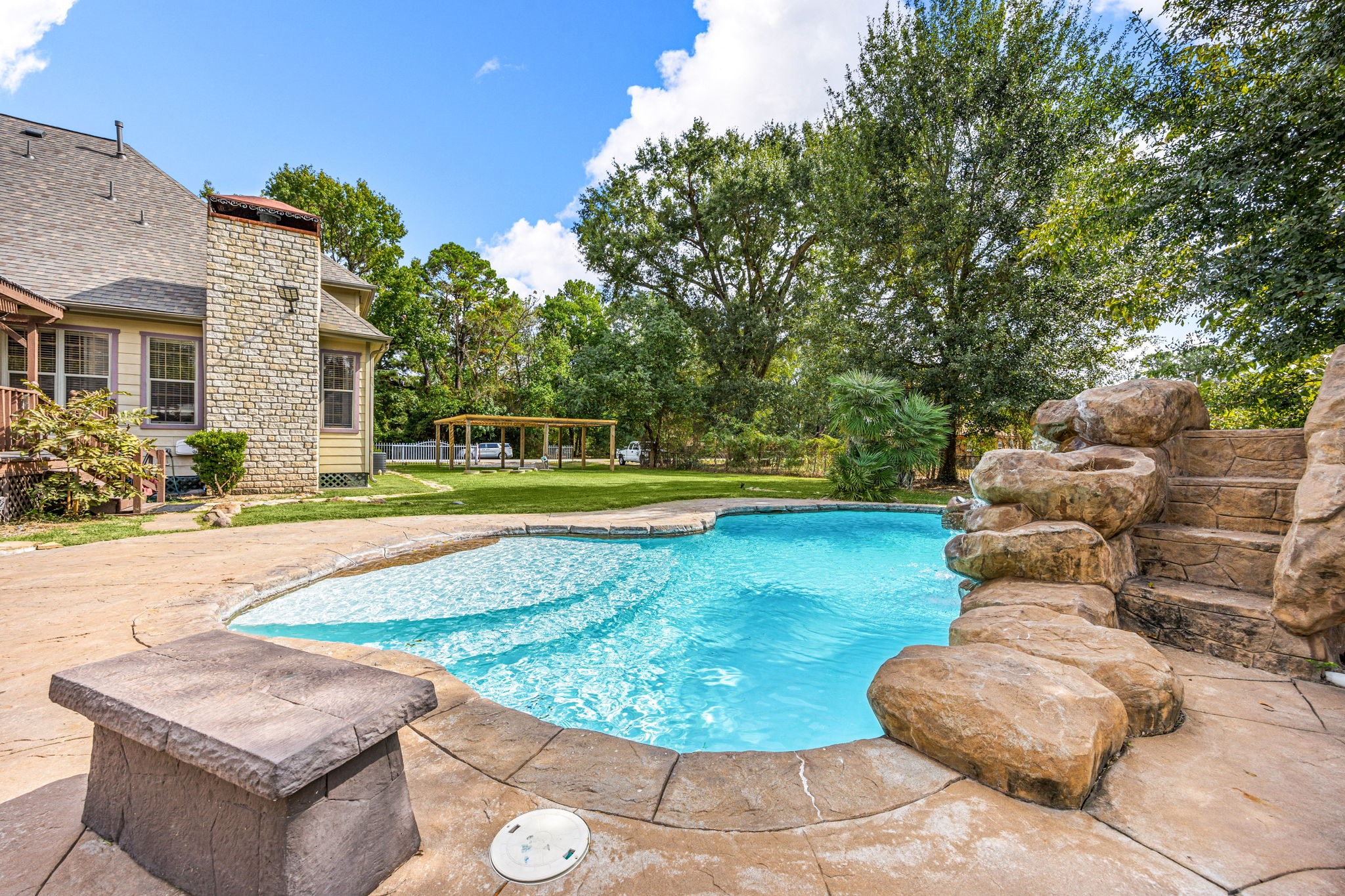 21427 Tophill Drive Spring, TX 77388 - Photo 48 of 50 a view of a swimming pool with lounge chair