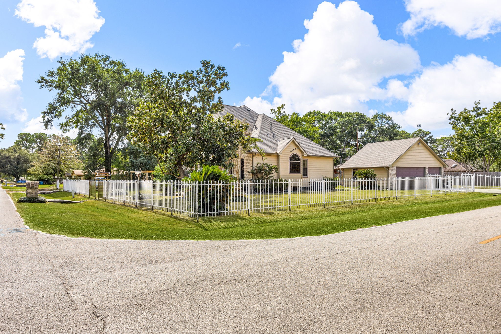 21427 Tophill Drive Spring, TX 77388 - Photo 9 of 50 a front view of a house with a yard and porch