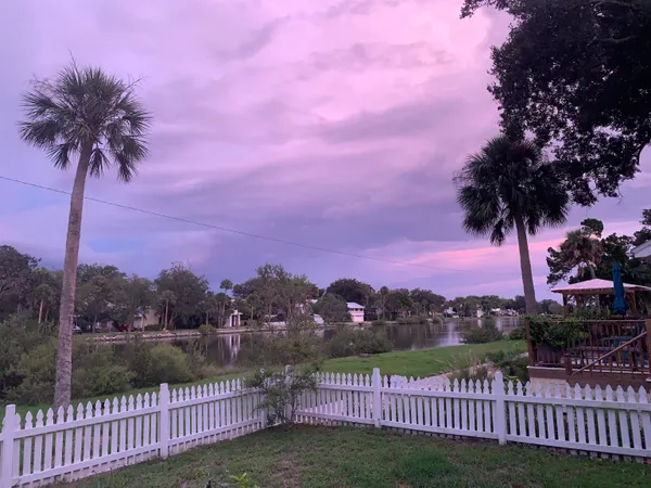 a view of a lake and a yard