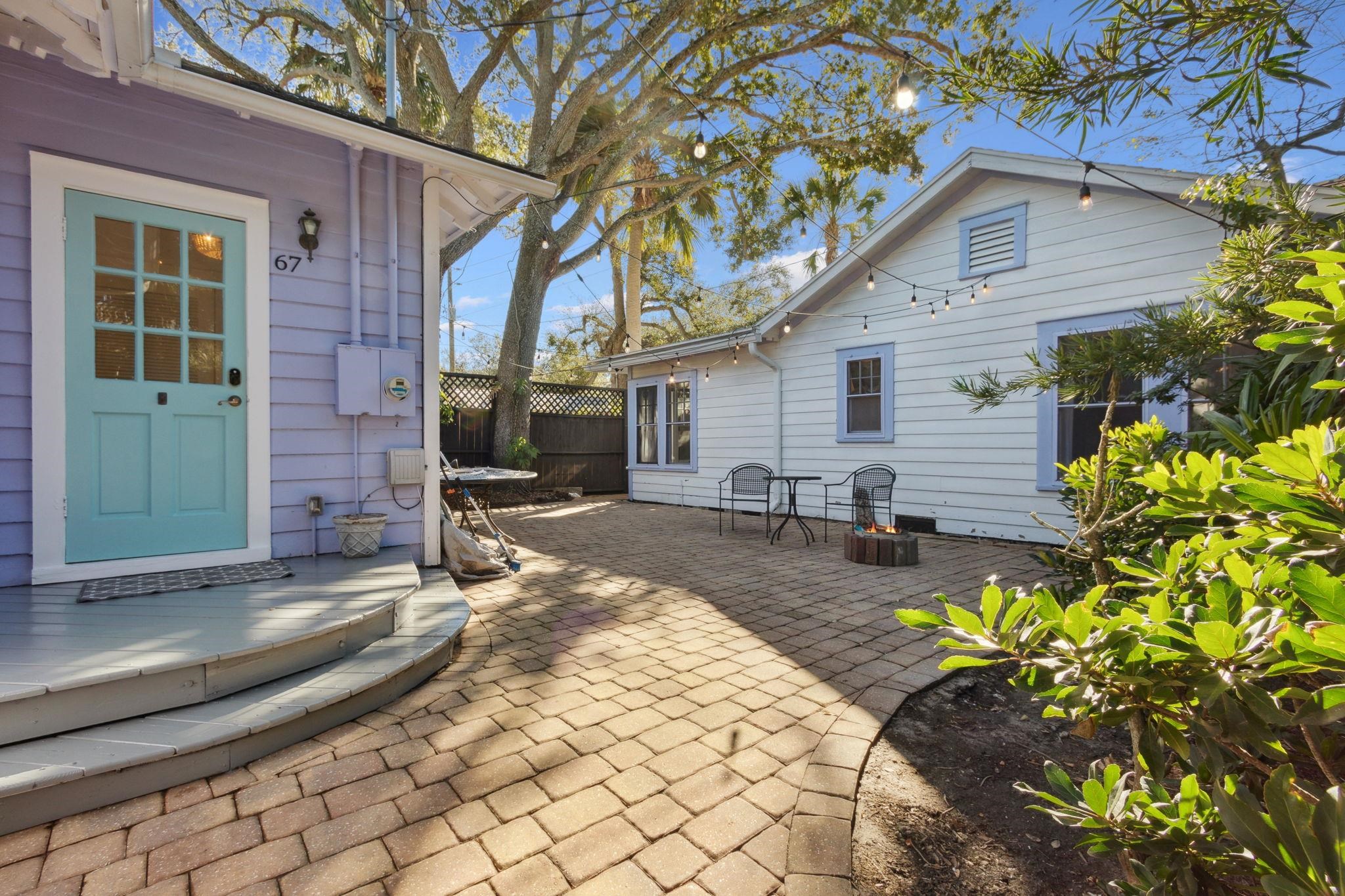 67 Park Place St. Augustine, FL 32084 - Photo 40 of 69 a front view of a house with a yard