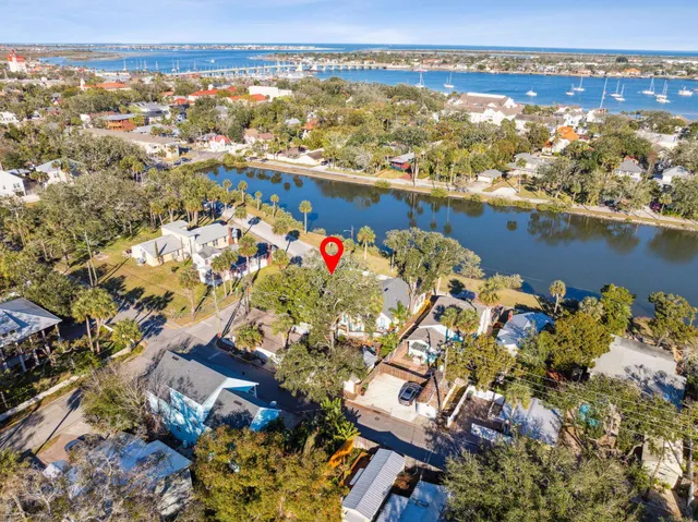 a view of a ocean with boats next to a dock