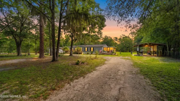 a house with trees in front of it