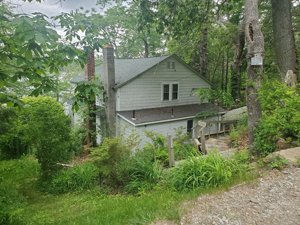 288 Clark Rd Extension Sturbridge, MA 01518 - Photo 12 of 14 a view of a house with large trees