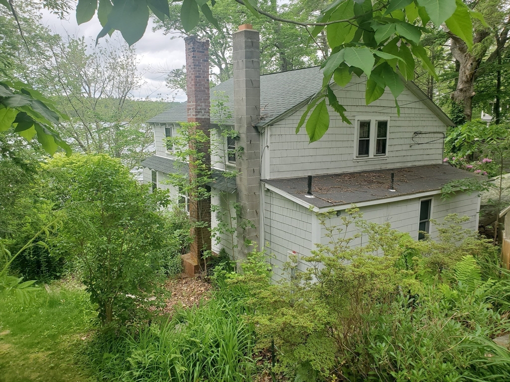 288 Clark Rd Extension Sturbridge, MA 01518 - Photo 4 of 14 a view of a house with a small yard