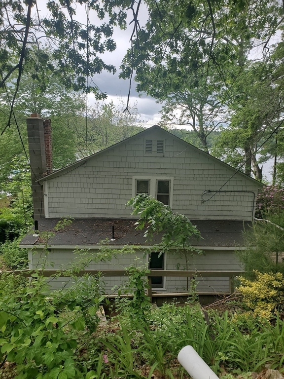 288 Clark Rd Extension Sturbridge, MA 01518 - Photo 5 of 14 a backyard of a house with lots of green space