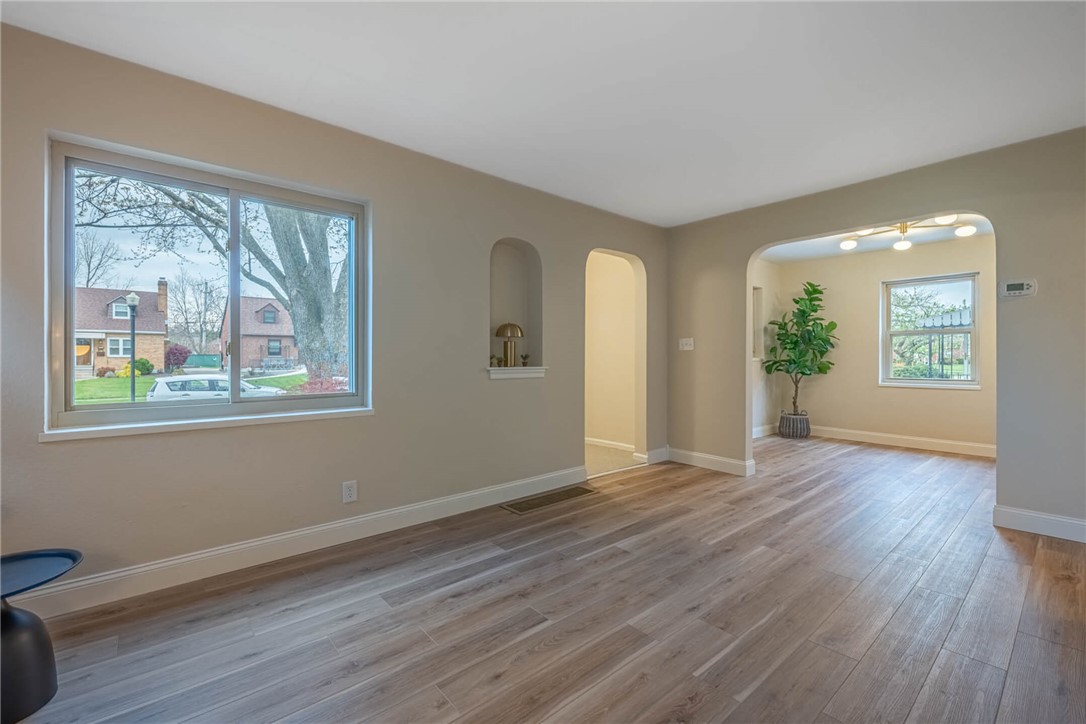 1012 Hampshire Road Dayton, OH 45419 - Photo 10 of 39 This bright living space features elegant flooring and graceful arched doorways.