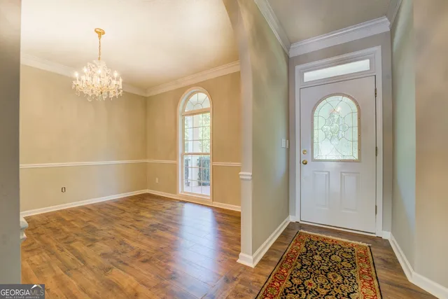 a bathroom with a sink a mirror and a shower