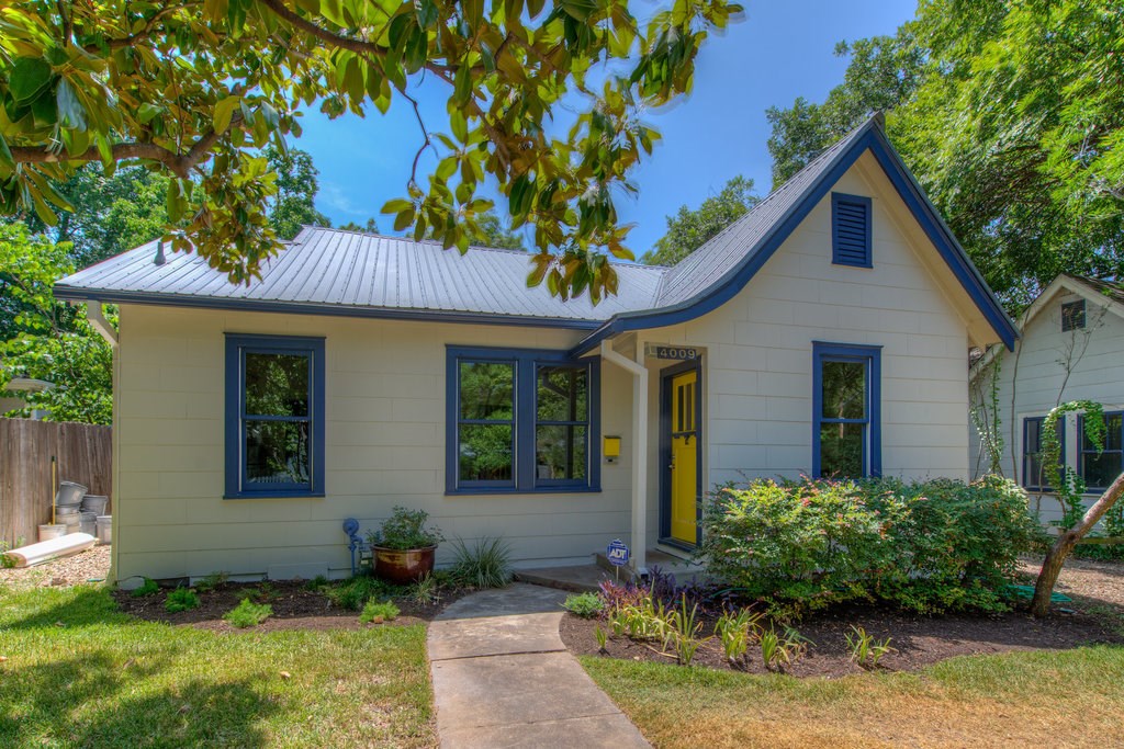 4009 Rosedale Avenue Austin, TX 78756 - Photo 1 of 1 a front view of a house with a yard