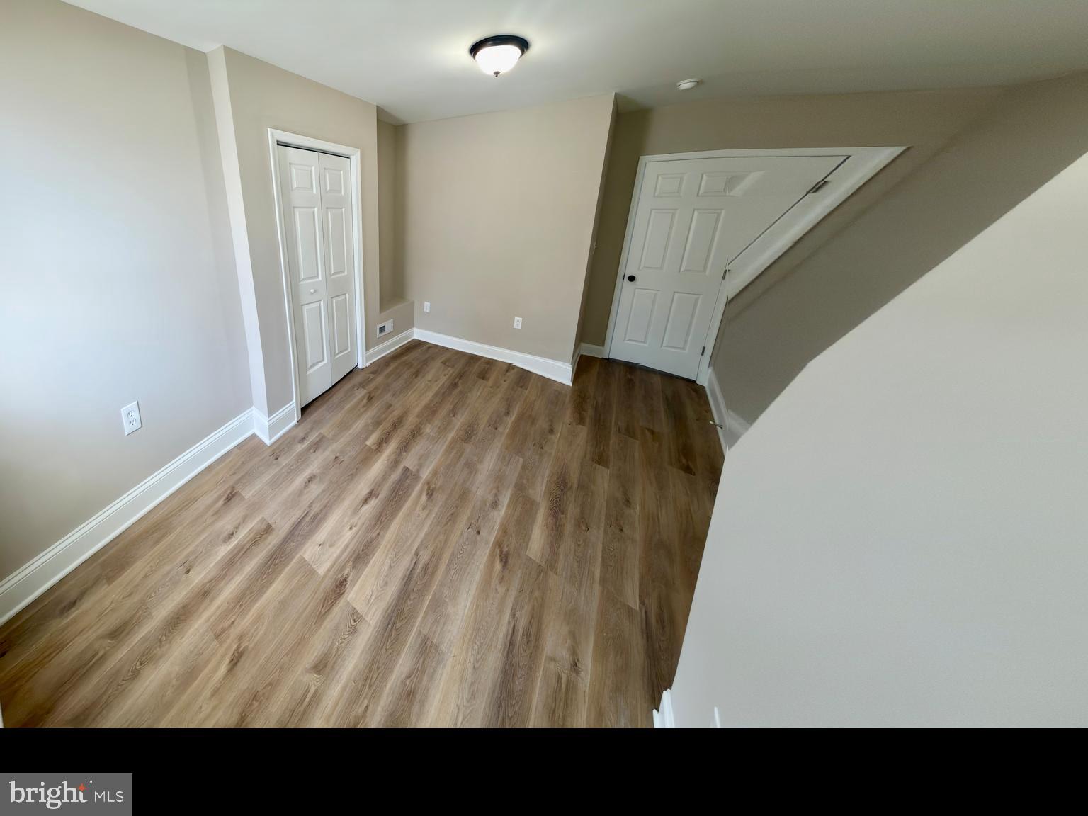 2129 Federal Street Baltimore, MD 21213 - Photo 14 of 27 a view of small space with wooden floor
