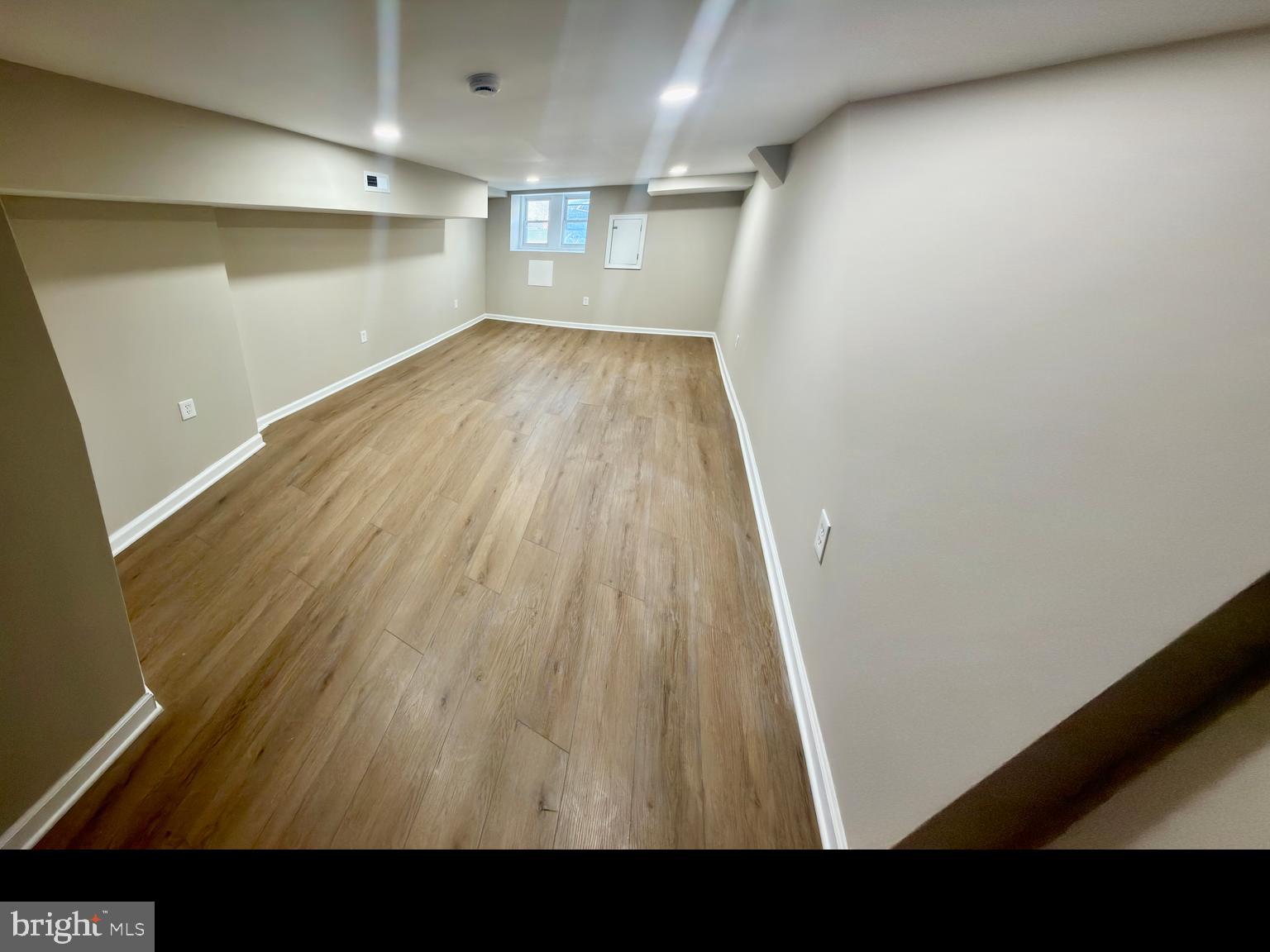 2129 Federal Street Baltimore, MD 21213 - Photo 20 of 27 a view of empty room with wooden floor