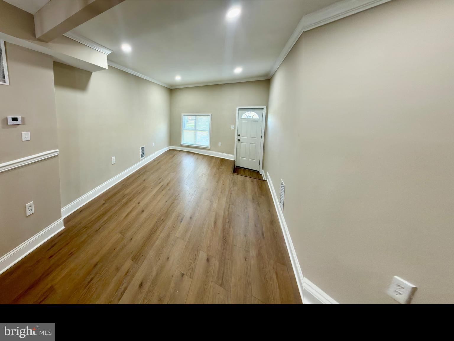 2129 Federal Street Baltimore, MD 21213 - Photo 21 of 27 a view of room with wooden floor