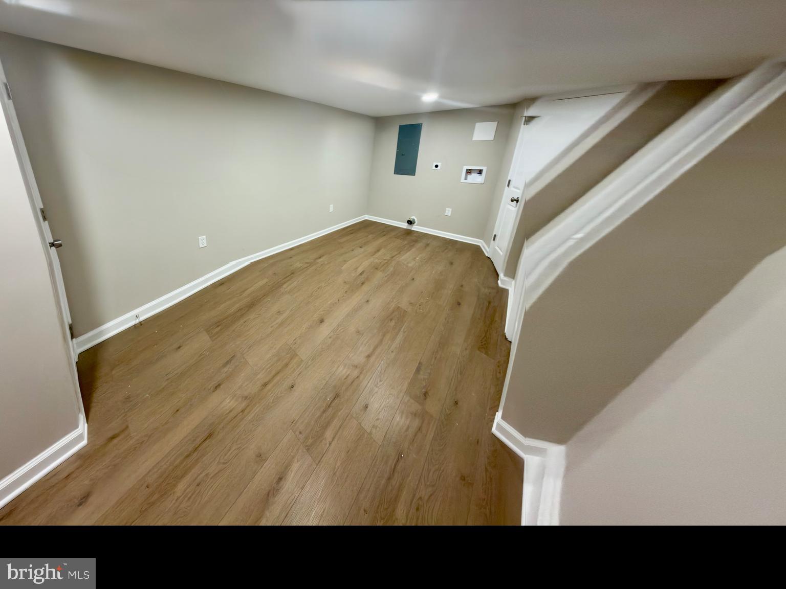 2129 Federal Street Baltimore, MD 21213 - Photo 26 of 27 a view of a big room with wooden floor