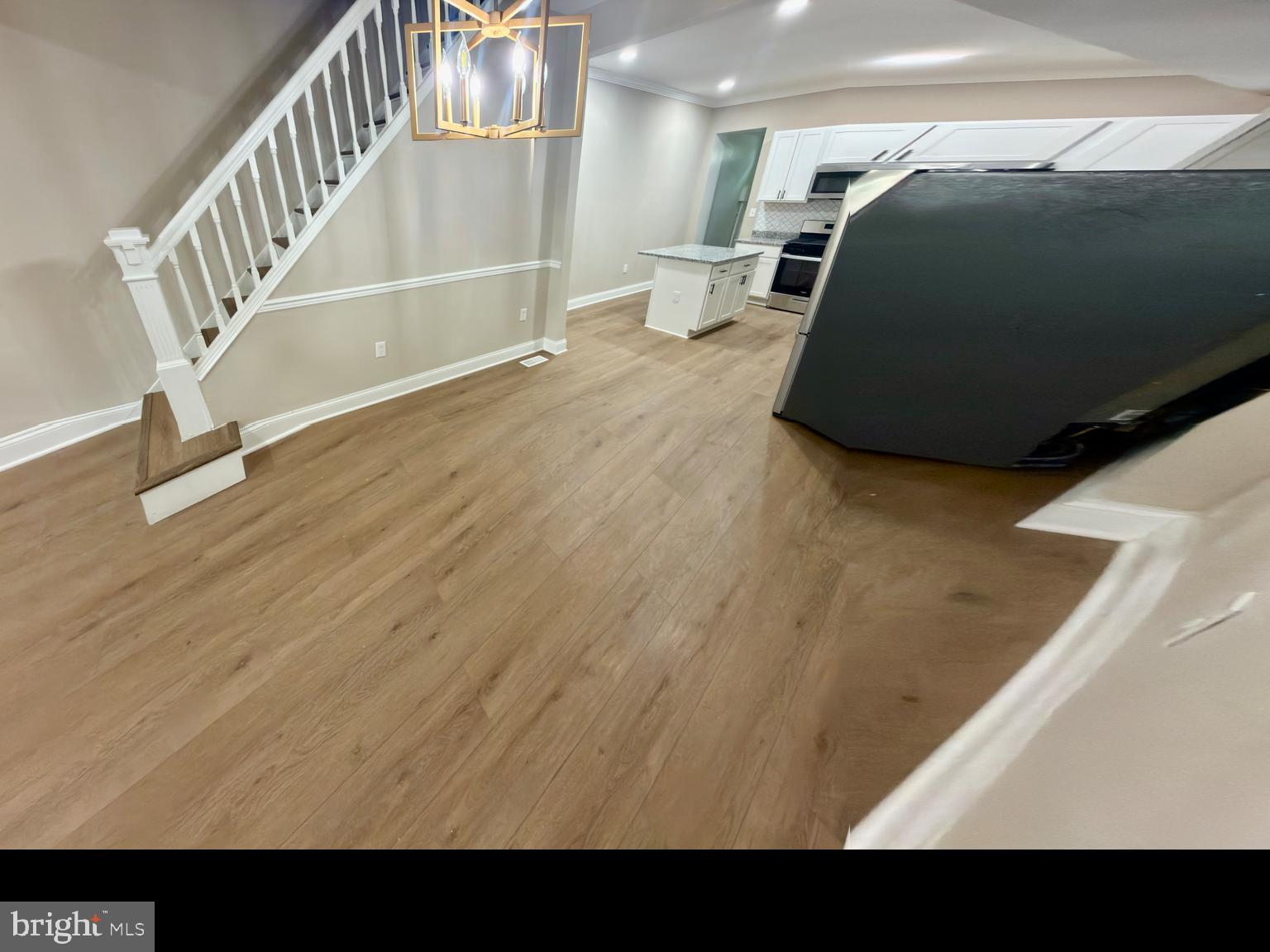 2129 Federal Street Baltimore, MD 21213 - Photo 5 of 27 a view of a living room and entryway