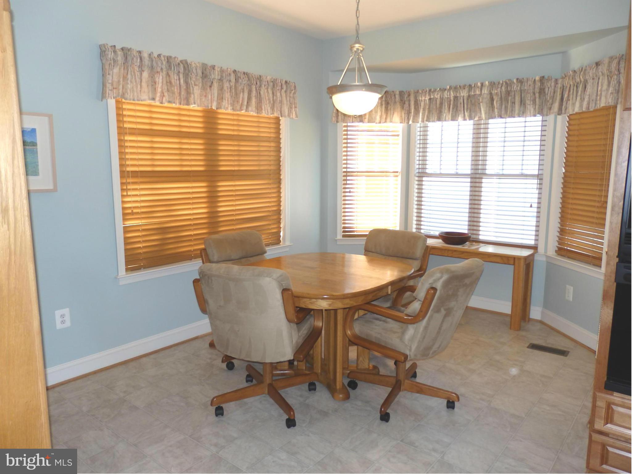 2643 Brook Valley Road Frederick, MD 21701 - Photo 12 of 30 Large breakfast room has bay window, door to deck