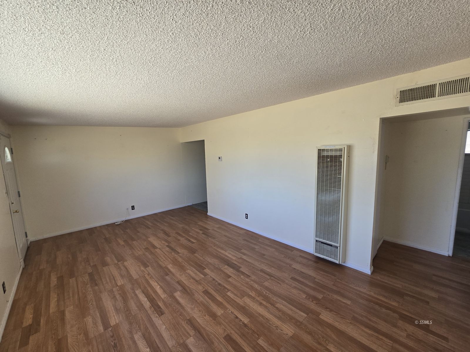 633 South Allen Street Ridgecrest, CA 93555 - Photo 5 of 21 a view of a room with wooden floor