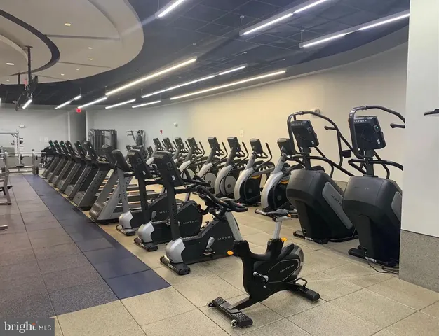 a kitchen with a table and chairs in it
