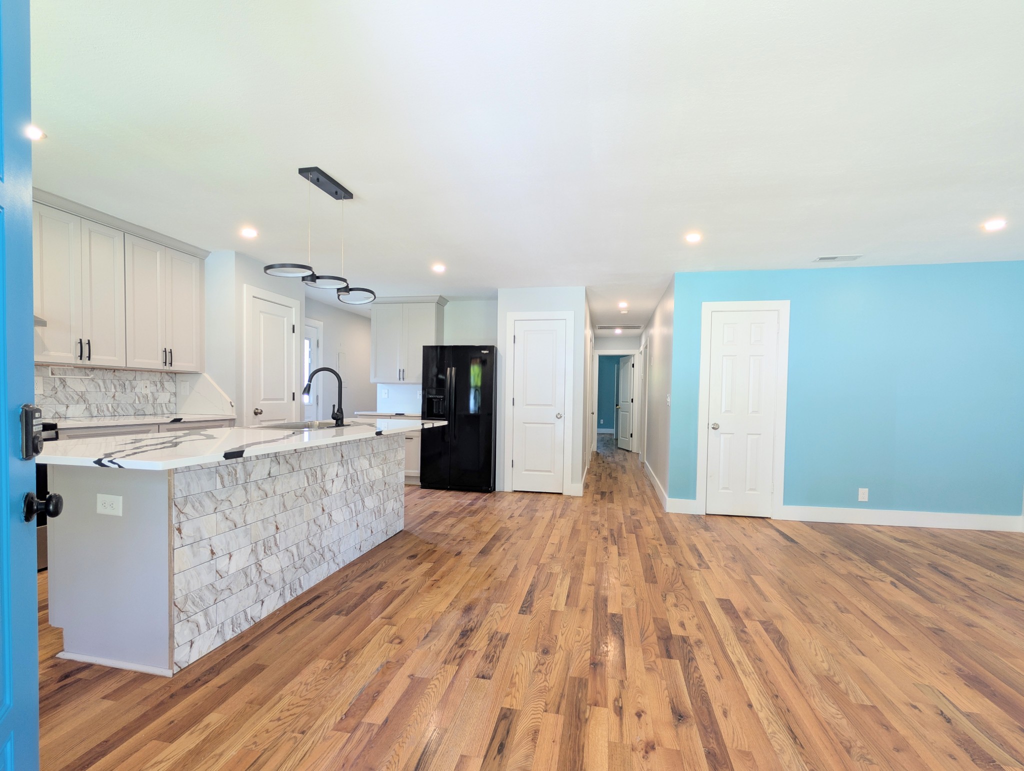244 Warrior Road Madison, TN 37115 - Photo 3 of 24 a large kitchen with kitchen island a sink stainless steel appliances and cabinets