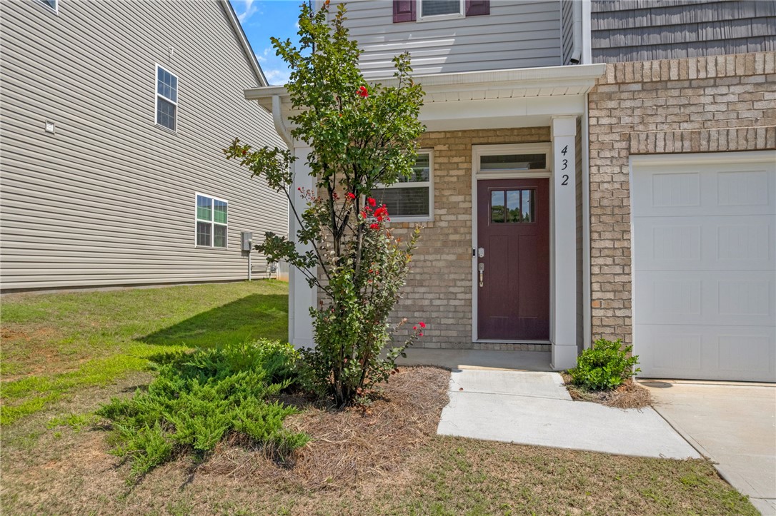 432 Bee Cv Way Pendleton, SC 29670 - Photo 5 of 39 This charming home offers a welcoming facade with a mix of brick and siding.