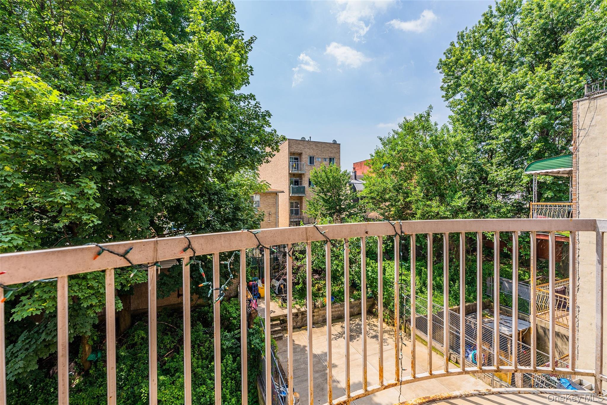 112-26 38th Avenue, Unit 4A Queens, NY 11368 - Photo 17 of 18 a view of a white roof deck