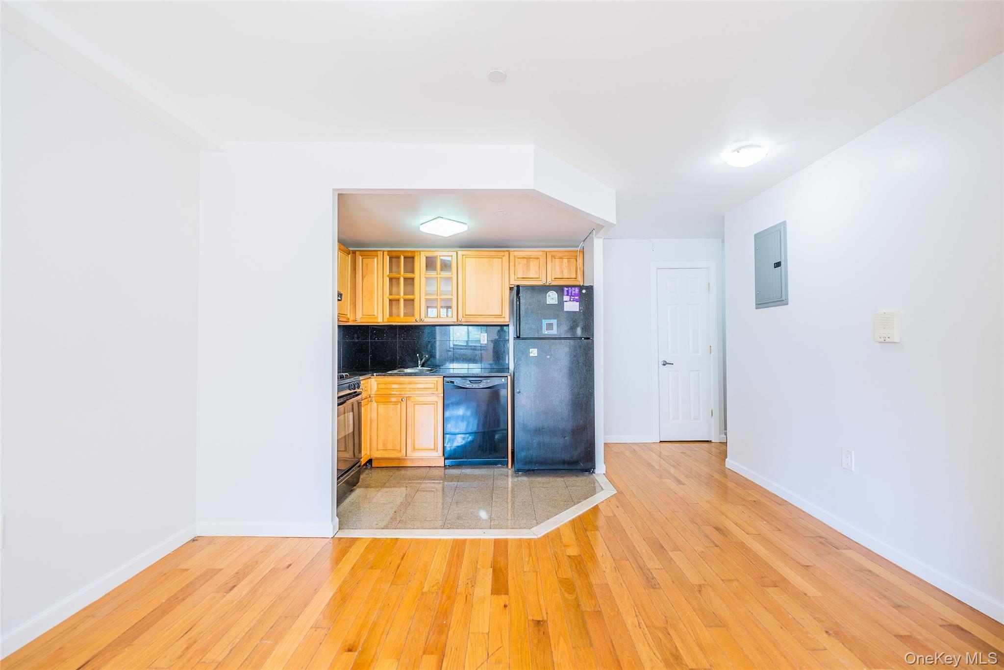 112-26 38th Avenue, Unit 4A Queens, NY 11368 - Photo 7 of 18 a bedroom with a bed and a window