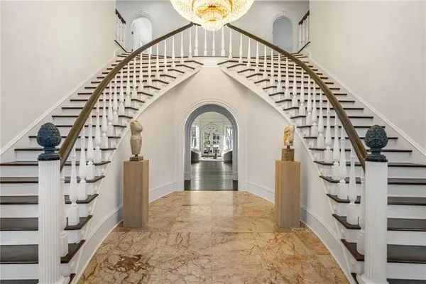 a view of a swimming pool with a lake view