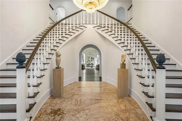 a view of a swimming pool with a lake view