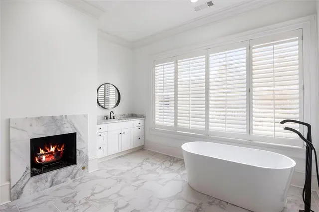 an aerial view of a house with a lake view