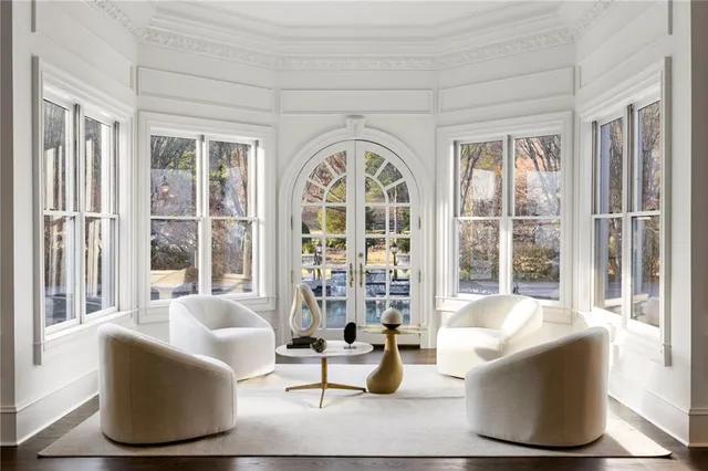 a kitchen with granite countertop a stove a sink and a microwave