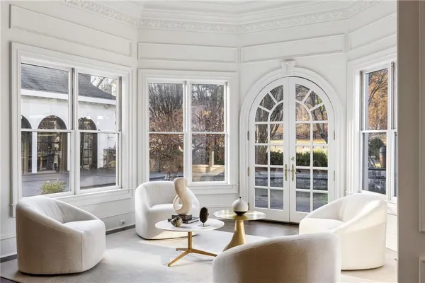 a kitchen with stainless steel appliances granite countertop a refrigerator and a stove