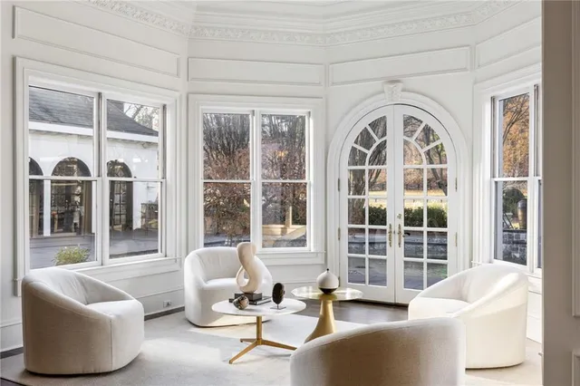 a kitchen with stainless steel appliances granite countertop a refrigerator and a stove