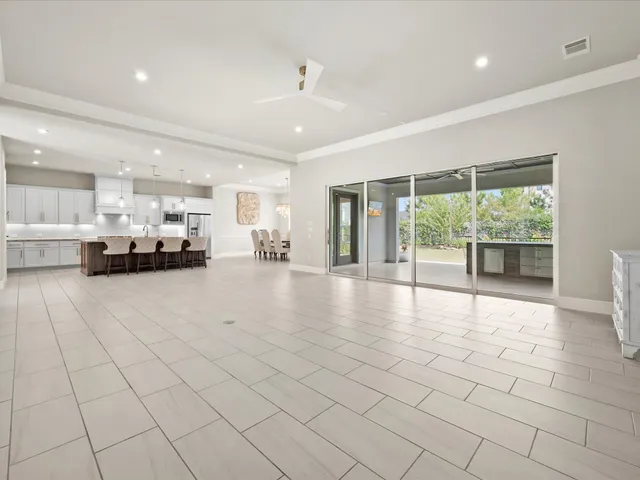 a kitchen with sink cabinets and window