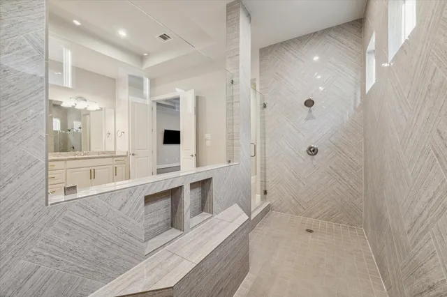 a view of an empty room with glass door