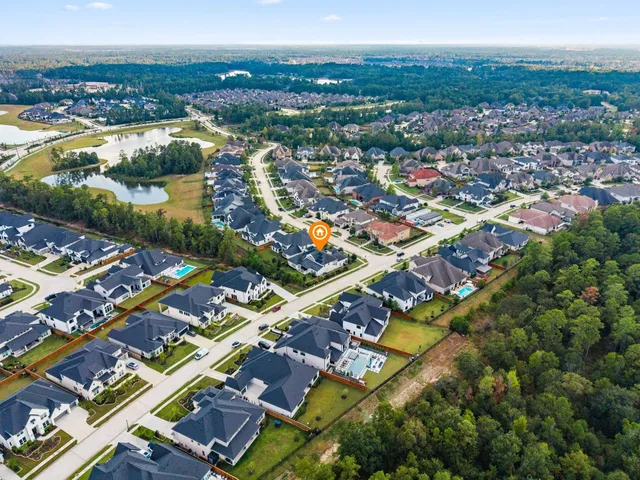 a front view of house with flowers