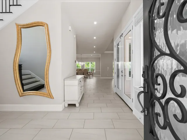 a view of entryway with stairs and furniture